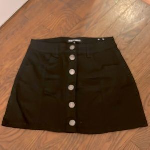 Black button mini skirt